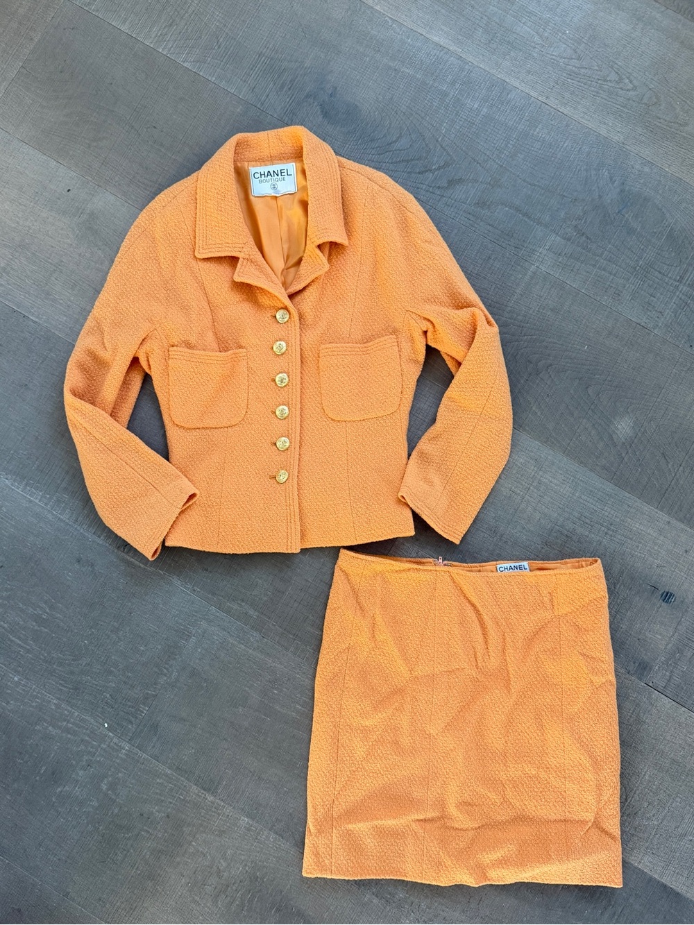CHANEL Orange Tweed Jacket and Skirt Set with Gold Buttons